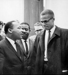 Martin Luther King, Jr. speaking with Malcolm X